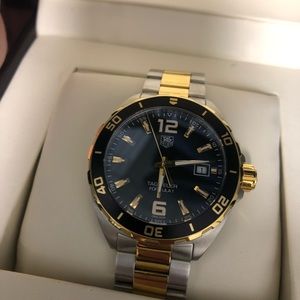 Tag Heuer Formula one two tone quartz. Sized but never worn. Model WAZ1121